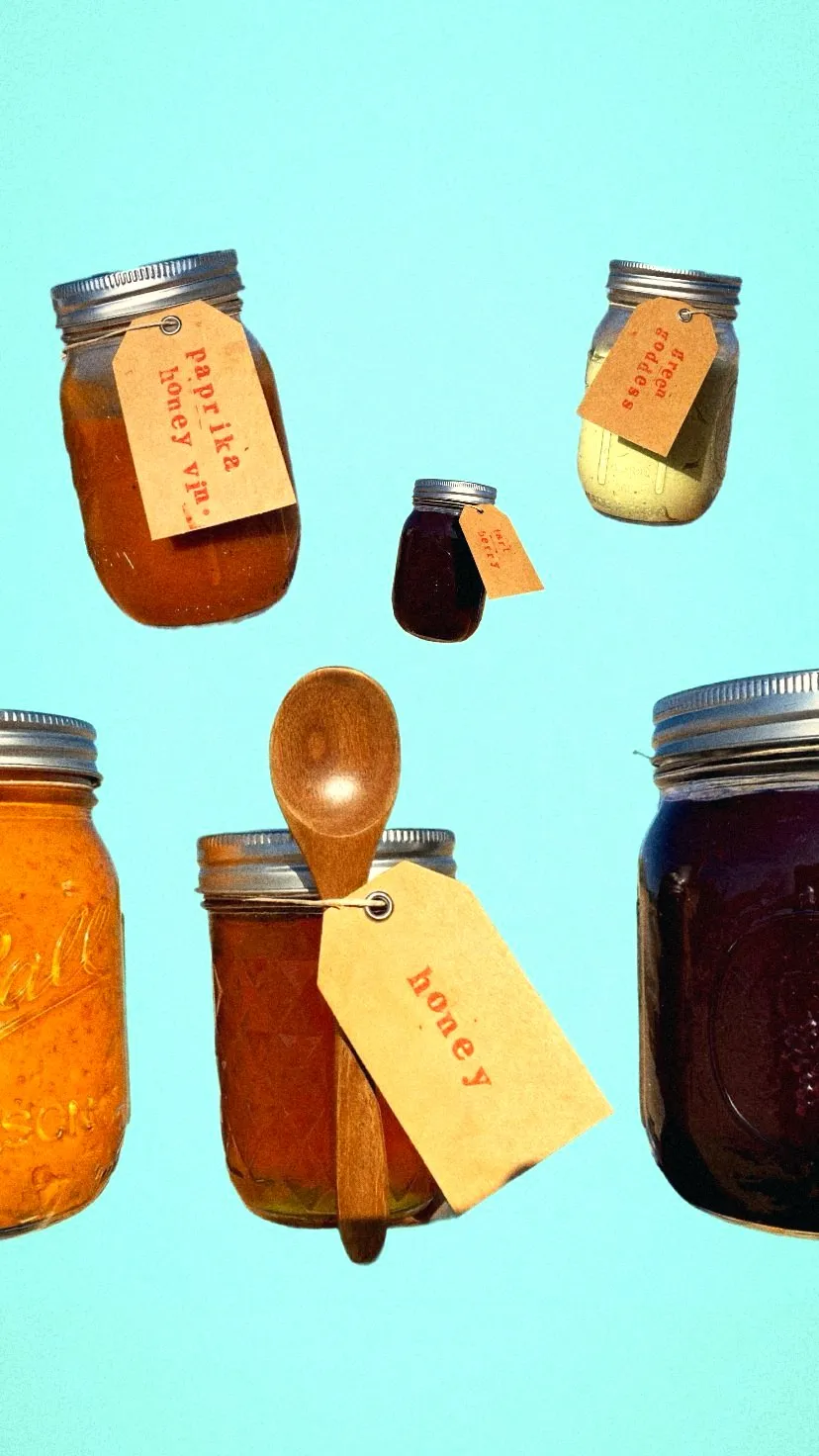 Jars of paprika honey vinaigrette, green goddess, honey and jam with kraft tags