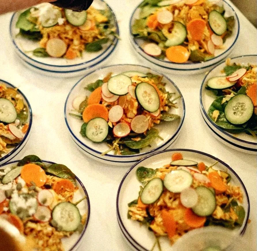 Plated salads with cucumber, radish and carrot